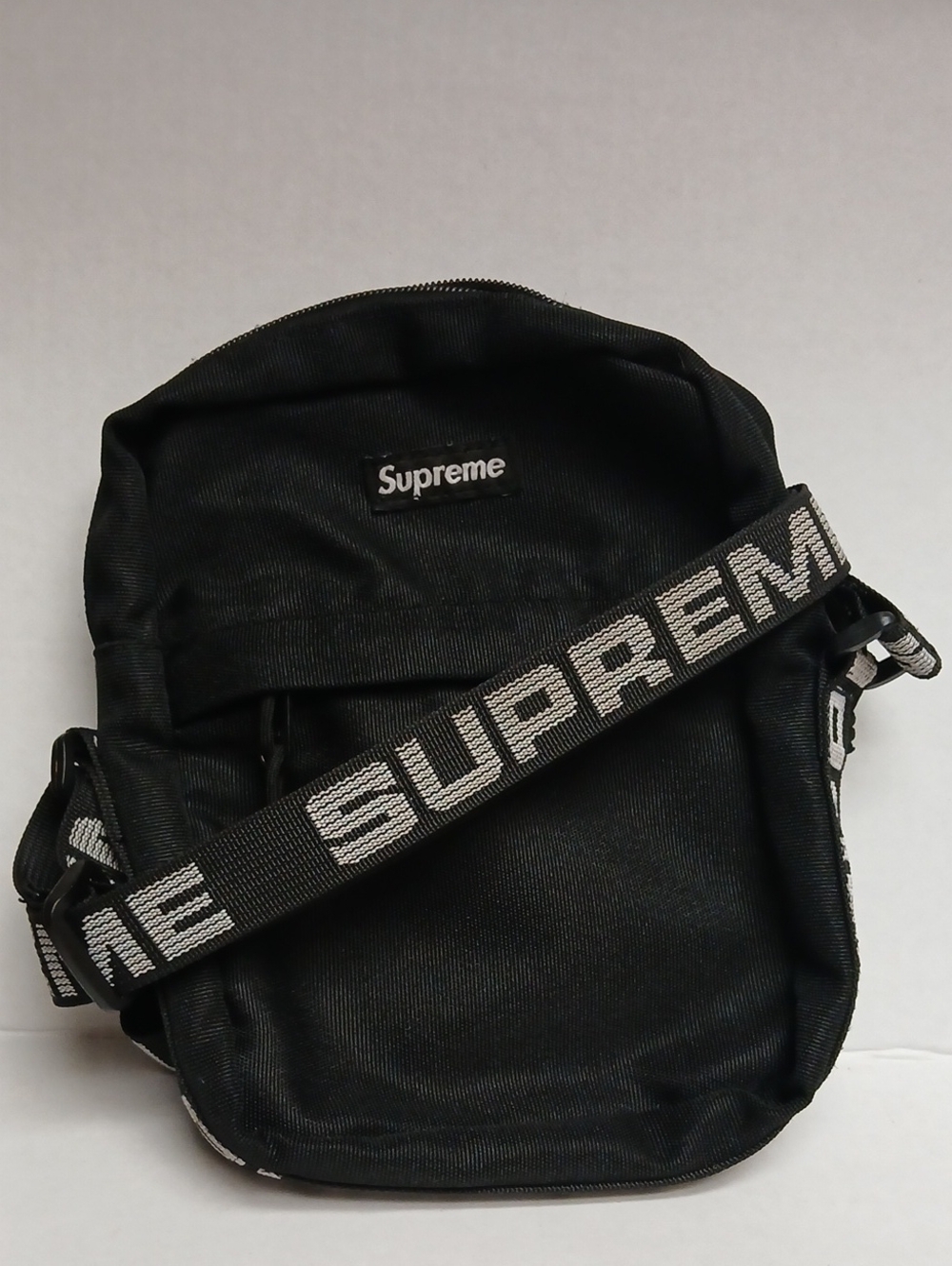 Supreme Black Crossbody Bag with White Logo Strap